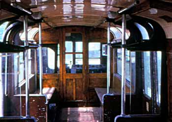 Inside former Southend Pier railway driving motor carriage looking towards the driver's cab.