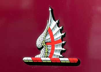 GWR Railmotor coat of arms with what could be a sea horse and English flag.