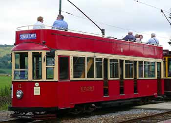 Seaton Tram 12 in London red livery.
