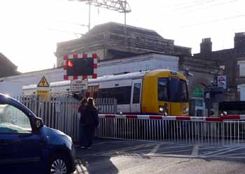 Acton Central level crossing.